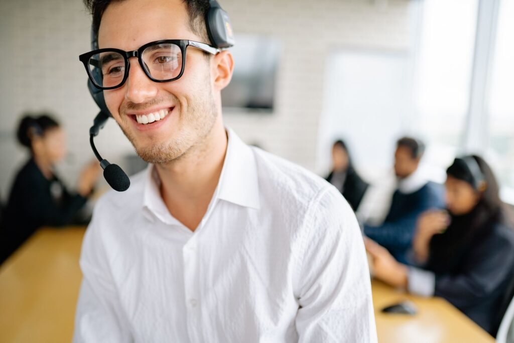 Professional communicating with a customer through a headset